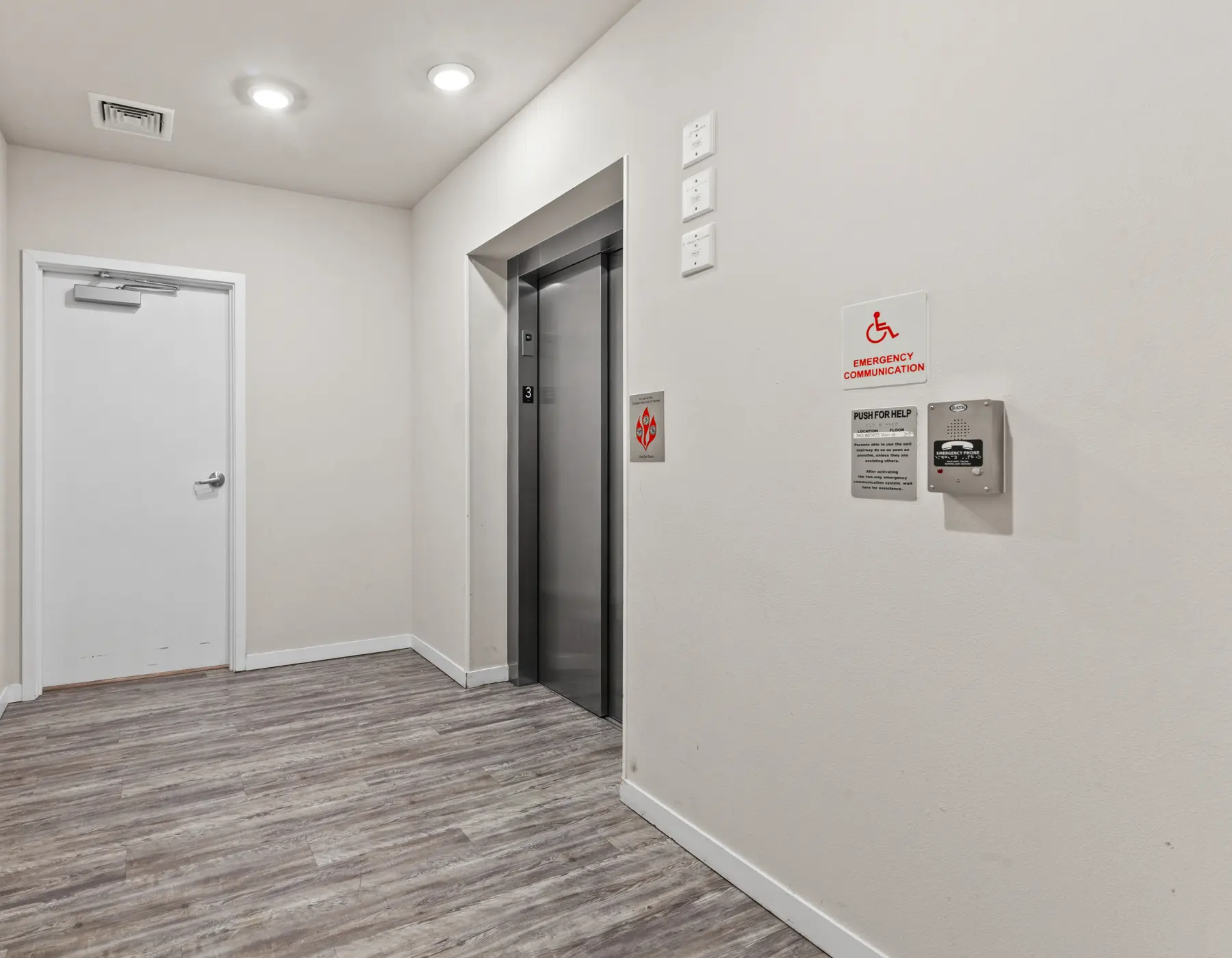 Modern Lobby and Elevator Area at The Corners