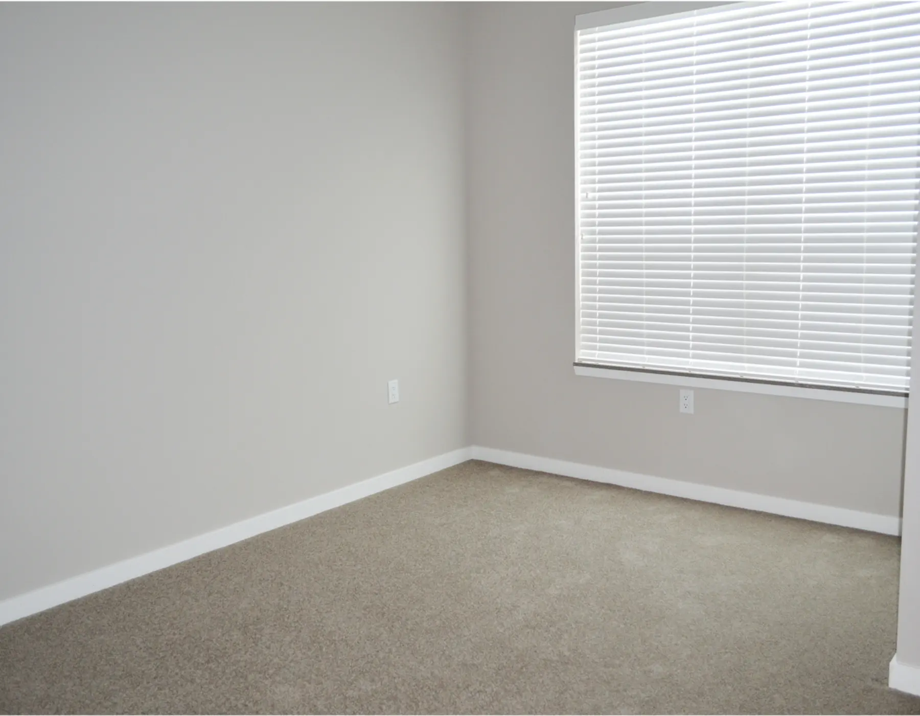 Spacious Bedroom Interior at The Corners